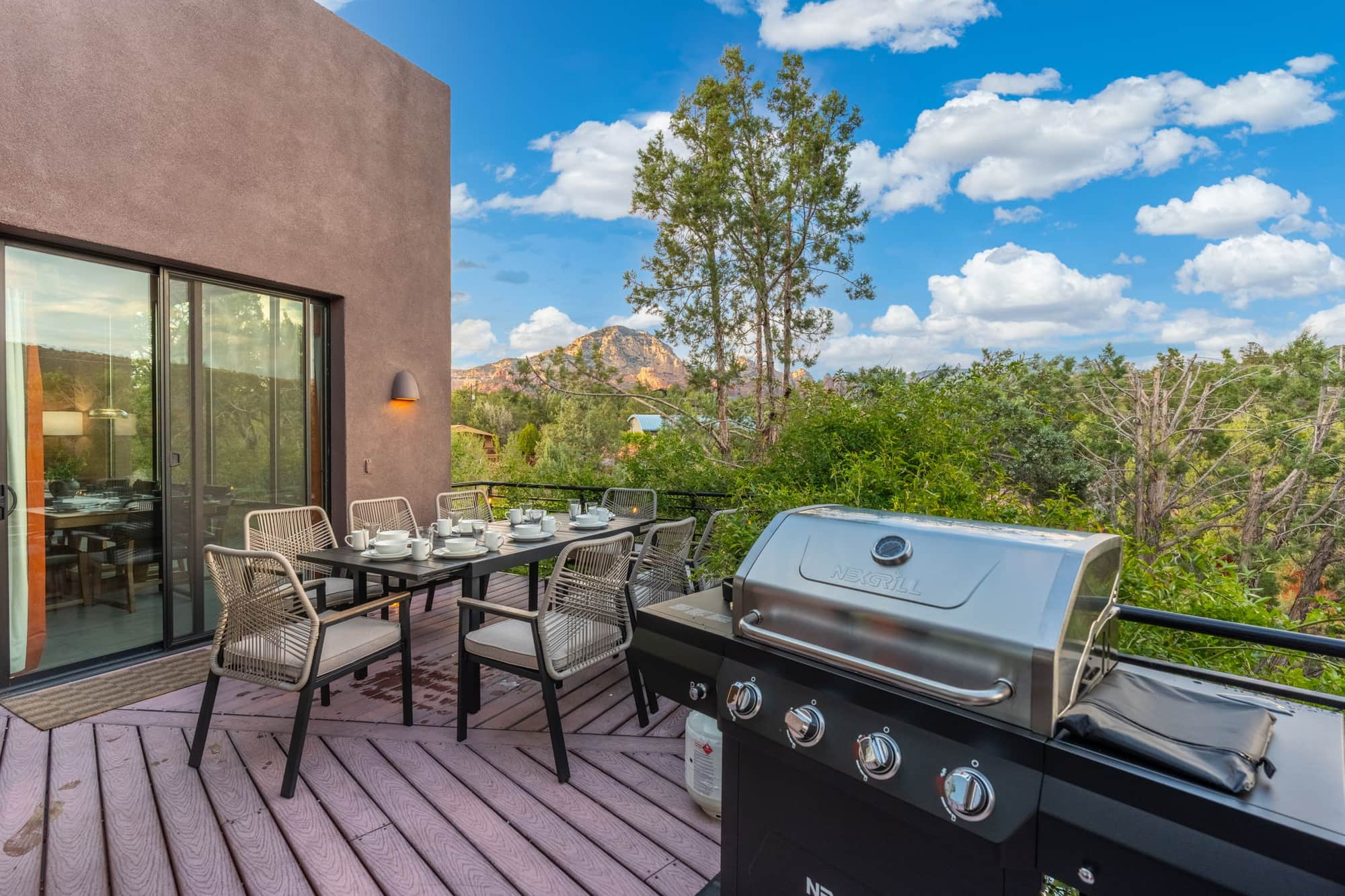 The gas grill on the patio